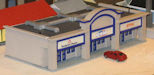 Download the .stl file and 3D Print your own Auto Parts Etc. HO scale model for your model train set.