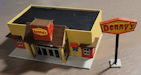 Download the .stl file and 3D Print your own Denny's N scale model for your model train set.