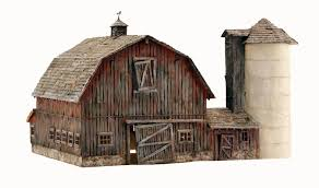 Woodland Scenics H0, Old Weathered Barn Item # BR5038. Old Weathered Barn is a stunning representation of a traditional gambrel barn with a concrete silo. Although this iconic beauty has seen better days, it will add charm and character to the rural area of any layout. Building includes field stone foundation, shake shingled roof, hayloft door with pulley and rope, a vintage weather vane atop a slatted cupola, concrete grain silo, implement shed and intricately styled, paned windows and traditional barn doors in various states of disrepair. See photos for footprint.