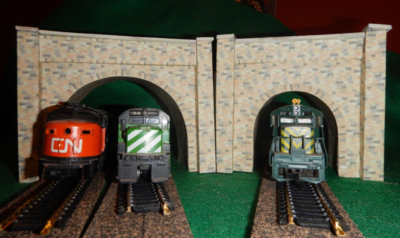 Make your own printable N scale model train set Multicolored Stone tunnel portals for your N scale model railroading train set experience. Download your free model train set Multicolored Stone tunnel portals for your N scale model train set.