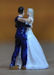 Download the .stl file and 3D Print your own Dancing wedding couple HO scale model for your model train set.