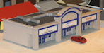 Download the .stl file and 3D Print your own Auto Parts HO scale model for your model train set.