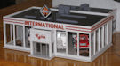 Download the .stl file and 3D Print your own Dealership HO scale model for your model train set.