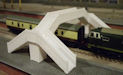 Download the .stl file and 3D Print your own Footbridge N scale model for your model train set.