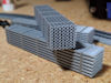 Download the .stl file and 3D Print your own Pipe Loads N scale model for your model train set.
