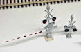 Download the .stl file and 3D Print your own Railroad Crossing Signs N scale model for your model train set.
