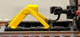 Download the .stl file and 3D Print your own Track Bumpe N scale model for your model train set.