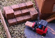 Download the .stl file and 3D Print your own Wooden Pallets N scale model for your model train set.