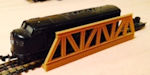 Download the .stl file and 3D Print your own Warren Truss Bridge N scale model for your model train set from www.krafttrains.com.