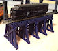 Download the .stl file and 3D Print your own Wooden Trestle Bridge N scale model for your model train set. 