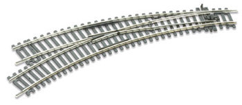 ST-245 Curved Turnout, Left Hand 00/H0 Scale. Item # ST-245. PECO Setrack 00/H0 Gauge Code 100 - Unit trackage System
The high quality rigid unit trackage system suitable for all popular brands of 00/H0 gauge model trains.
Being fully compatible with the Code 100 PECO Streamline range, it need never be discarded as your layout develops.
The solid nickel silver rails are integrally moulded into the sleeper bases for maximum realism and strength. Turnouts are fitted with an over-centre spring for immediate use, no extra levers necessary. 2nd and 3rd Radius Curved Left Hand Turnout
Technical Specification:
Frog Angle: 11.25 Degrees.