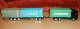 Build your own free 3D N scale shipping containers display for you N scale model train set. Gust download the free 3D printable 40ft shipping container PDF File, print out the shipping containers and fold. Then place your very own shipping container on you N scale model train set layout.