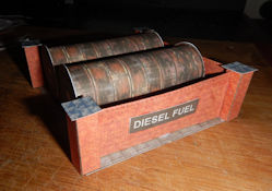 Printable n scale model Diesel Storage Tanks by www.krafttrains.com . For your n scale model train set. This n scale diesel storage tanks looks great as addition to a rail yard or a industrial scenery complex. Just download the PDF File and print out the diesel storage tanks to 110 lb. printable card stock and cut and fold. You can also use this diesel storage tank model for other model scenery then model trains.