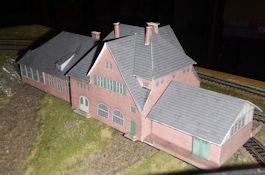 Build your own free N scale small town passenger train station model for your model train set or small town setting in N gage.  Just download the free PDF File and then print out on card stock paper. Printable n scale small town passenger train station 160 scale is ready for your n gage train set.