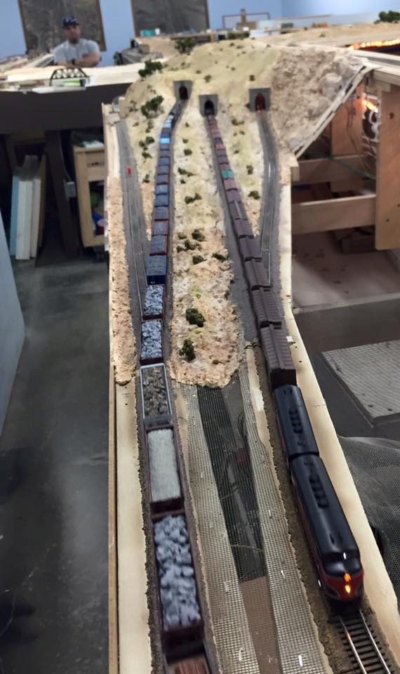 Welcome to the Los Angeles N-Scale Association, operators of East Valley Lines Model Railroad club located since 1979 in the Travel Town Museum at Griffith Los Angeles, California. View pitchers of the East Valley Lines N Scale Model Railroad club and see what they have done to their N scale layout. They operate one of the largest N-Scale layouts in the world. This is just a brief trip on the East Valley Lines' trackage. As you observe closely, there are lots of details to enjoy. This is truly a labor of love, involving countless hours, money and the talents of the many N-Scale modelers dedicated to the memory of great railroads. Brought to you to by www.krafttrains.com